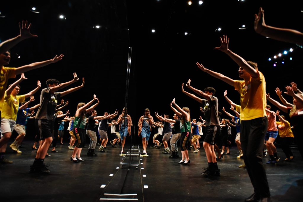 Students rehearse opening and closing numbers for the High School Musical Theatre Awards, HSMTA, during the second day of rehearsals Wednesday, May 17, 2017.