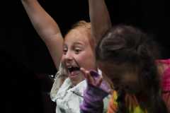 Students from Acting Out! play a theatre game during camp in the Addy Thursday, July 18, 2019.