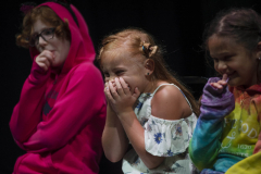 Students from Acting Out! play a theatre game during camp in the Addy Thursday, July 18, 2019.