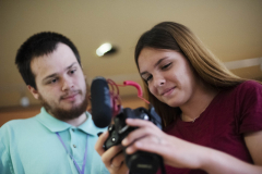 A filmmaking student sets up her camera before a shoot Thursday, July 18, 2019.